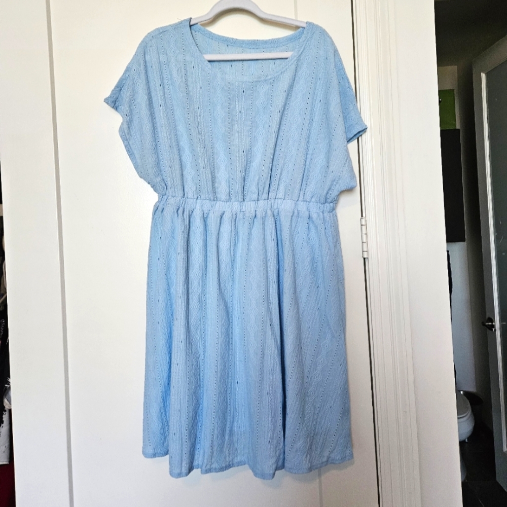 Blue eyelet dress.